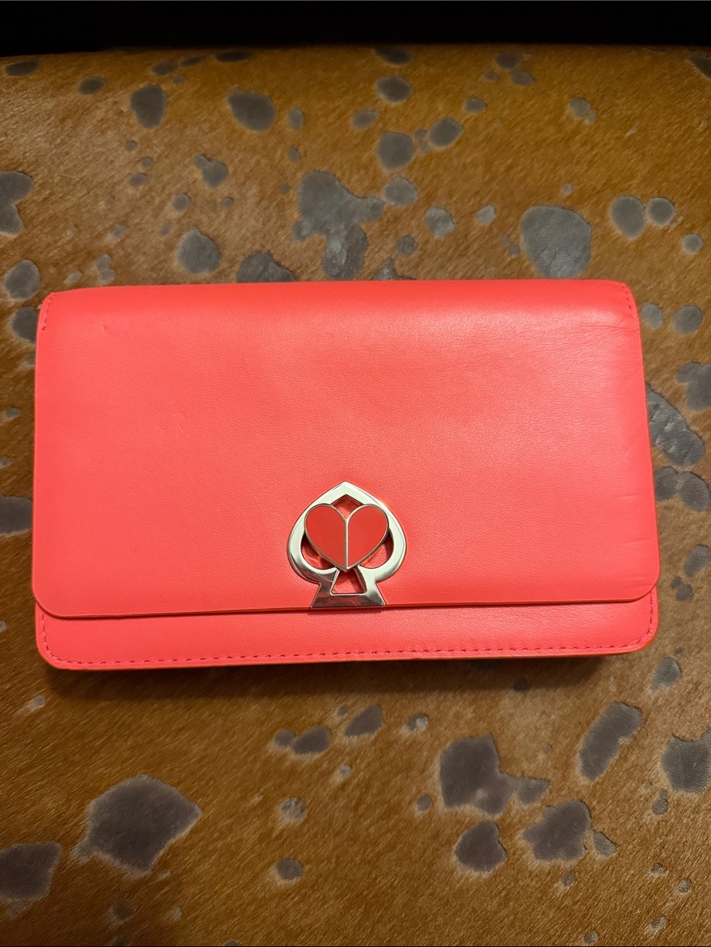 kate spade Coral Leather Clutch with Silver Spade Emblem